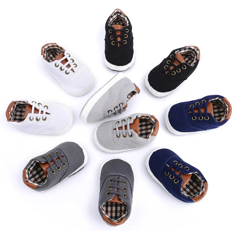 Solid colour baby canvas shoes with soft bottom and front strap in sizes 11cm to 13cm