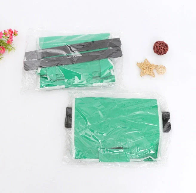Reusable eco-friendly folding shopper bag in green colour, with generous front pocket and durable, mold-resistant construction