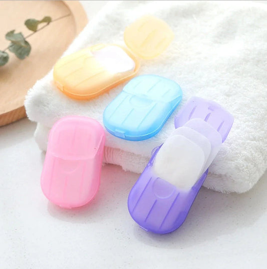 Compact disposable hand soap sheets in various colors, perfect for travel hygiene.