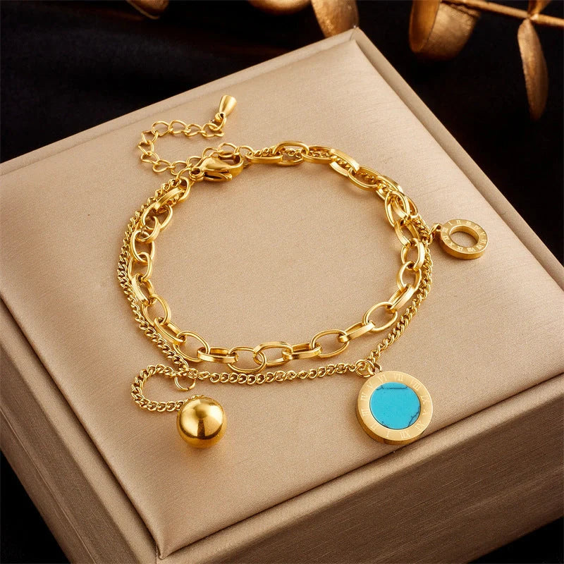 Gold plated punk fashion bracelet with double layer snake chain design and five-pointed star charm