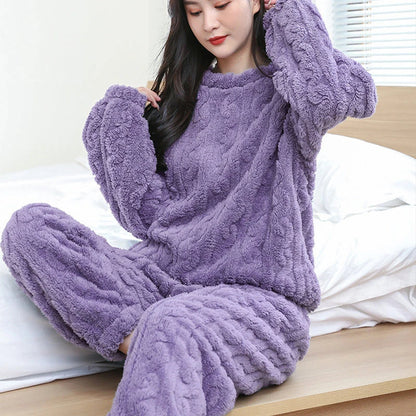 Cozy coral velvet pajama set with long sleeves and drawstring trousers for indoor and outdoor casual wear
