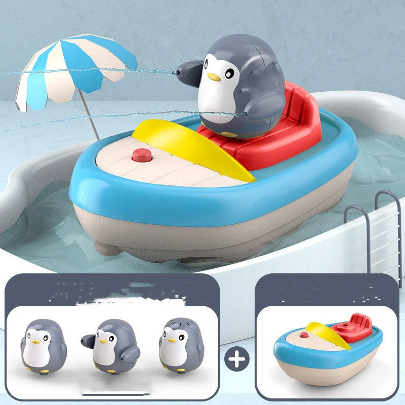 Toddler bath toys featuring an electric boat and three penguin sprinklers for fun bath time