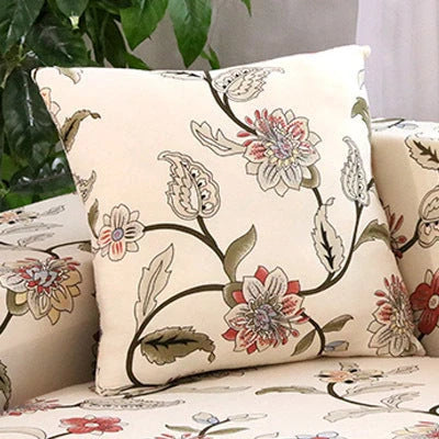 Stretchable geometric print sofa cover on a three-seater sofa