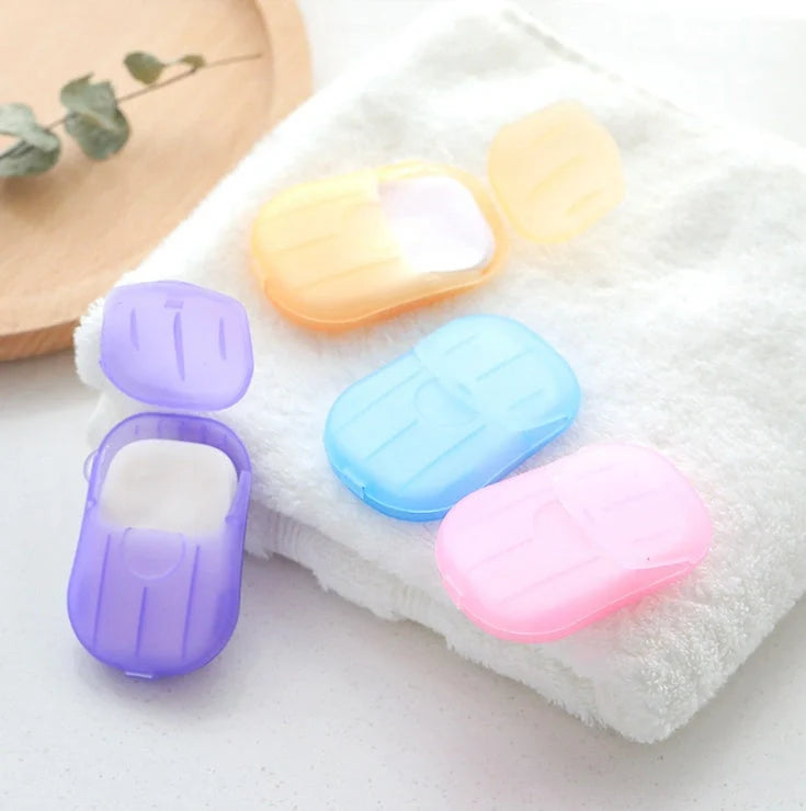 Compact disposable hand soap sheets in various colors, perfect for travel hygiene.