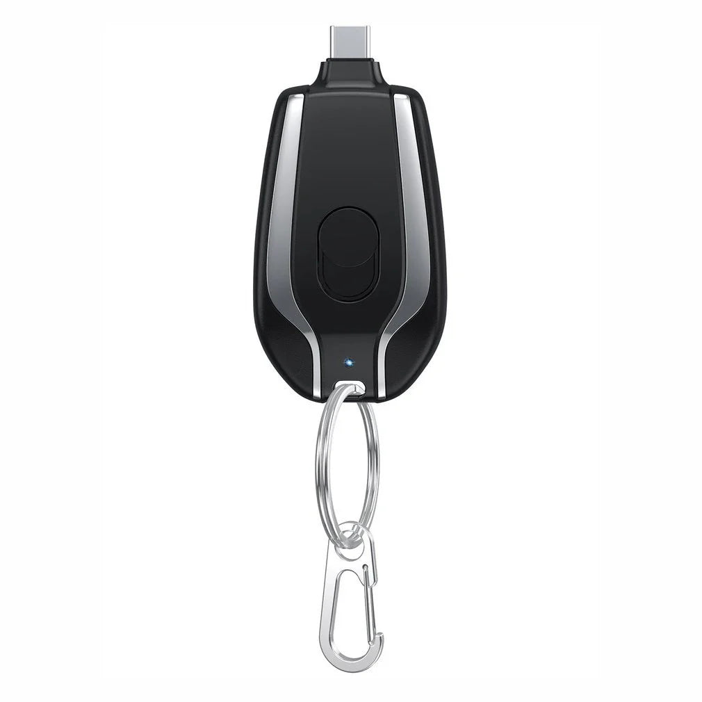 A compact, 1500mAh portable power bank with a keychain design, featuring a waterproof and durable construction for on-the-go charging of smartphones, tablets, and other USB-powered devices.