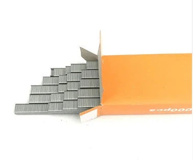 Compact garden hand tool for tying plant stems with plastic tape, measuring 300x200x100mm