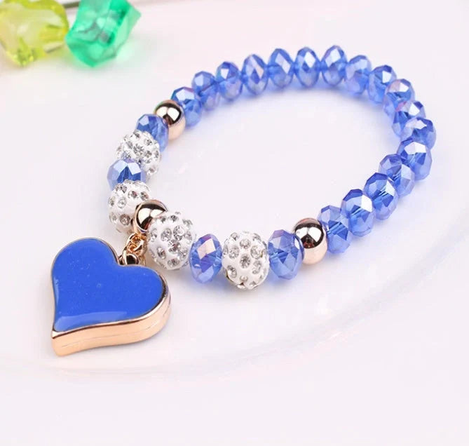 Elegant crystal heart-shaped bracelets in various vibrant colours, perfect for adding a touch of sophistication to any outfit
