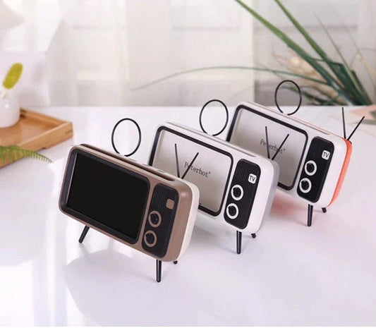 Vintage-inspired portable Bluetooth speaker with retro TV-style design and sleek, compact body