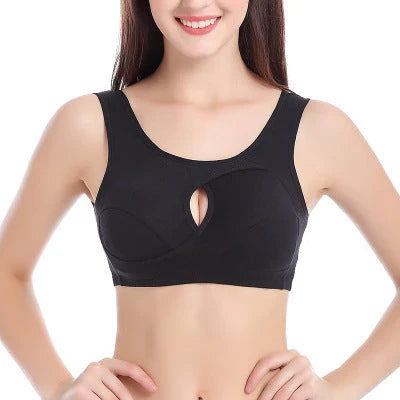 Supportive cotton sports bra with crossover design for lift and support, preventing sagging and bra lines