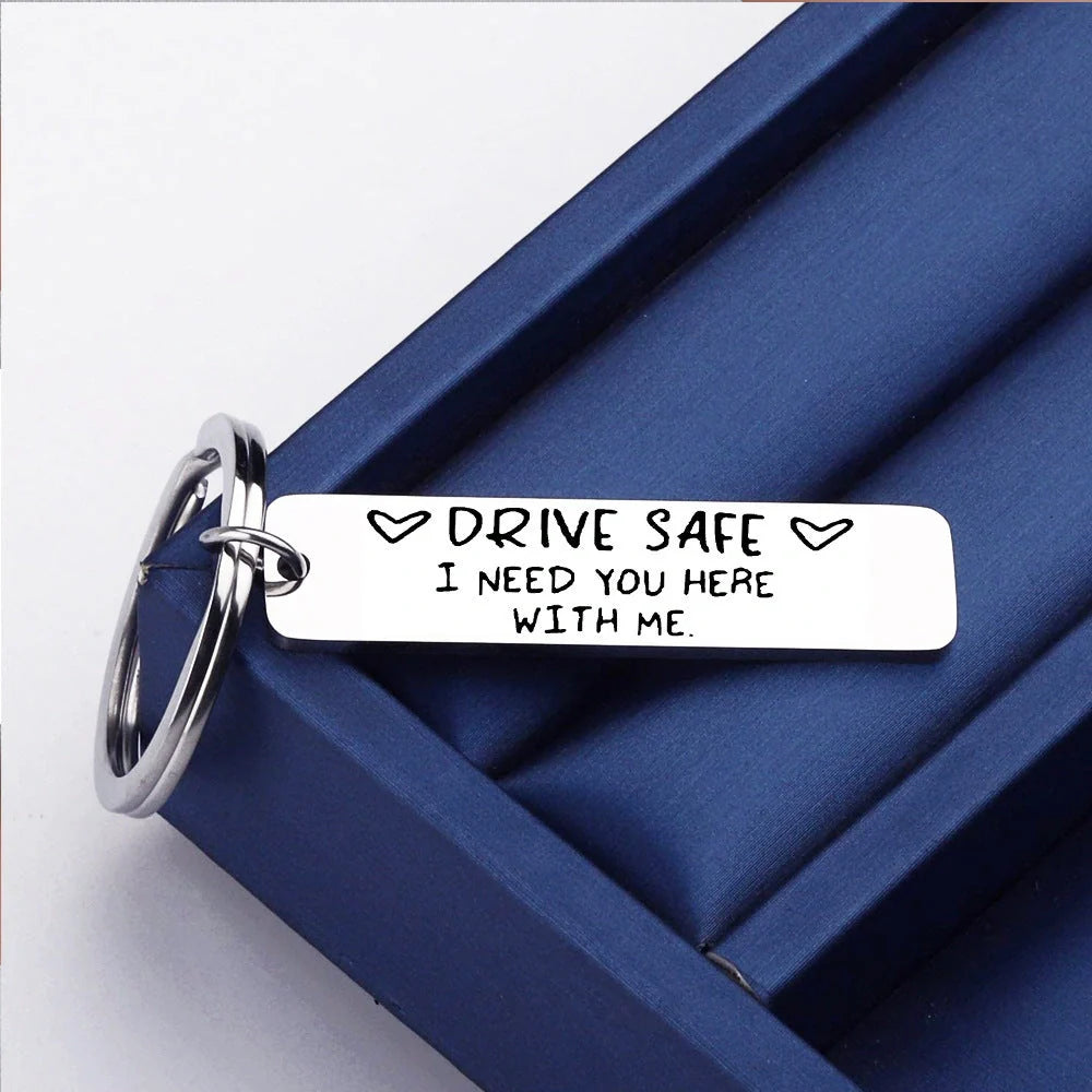 Stainless steel keychain with 'Be Safe Honey I Need You Here With Me' engraving