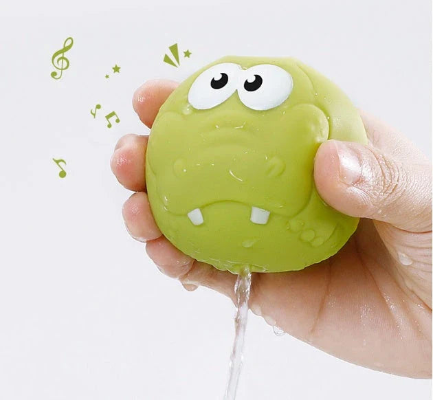 Colourful bath toys including a basketball hoop, fishing rods, and water-squirting animals for engaging bathtime play