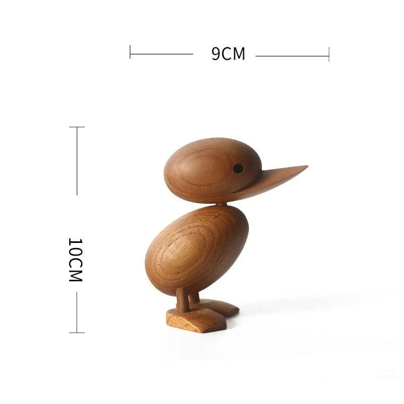 Handcrafted teak wood duck toy in duck yellow, available in large and small sizes
