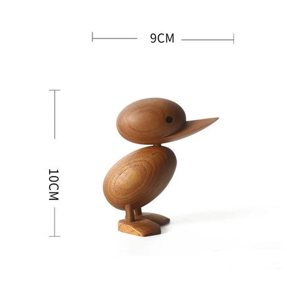 Handcrafted teak wood duck toy in duck yellow, available in large and small sizes