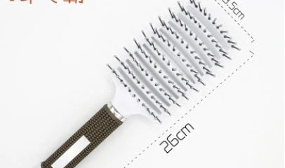A premium hair brush with a sleek design, featuring soft bristles and a rounded massage function for healthy, detangled hair