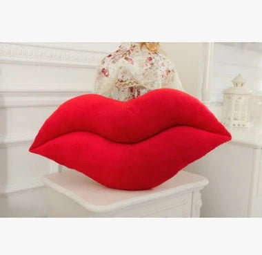 Adorable lip-shaped plush pillow for children in pink and red, perfect for cuddles and decor