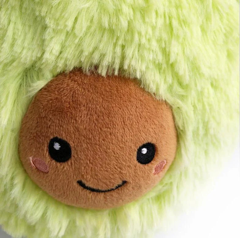 Soft and cuddly plush avocado-shaped pillow in various sizes, perfect for decoration, relaxation, and playtime