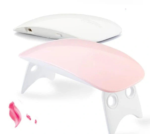 Compact and portable USB-powered nail light therapy machine with adjustable angle and LED light for at-home nail care