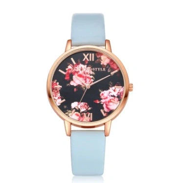 Rose gold quartz wrist watch with leather strap for women