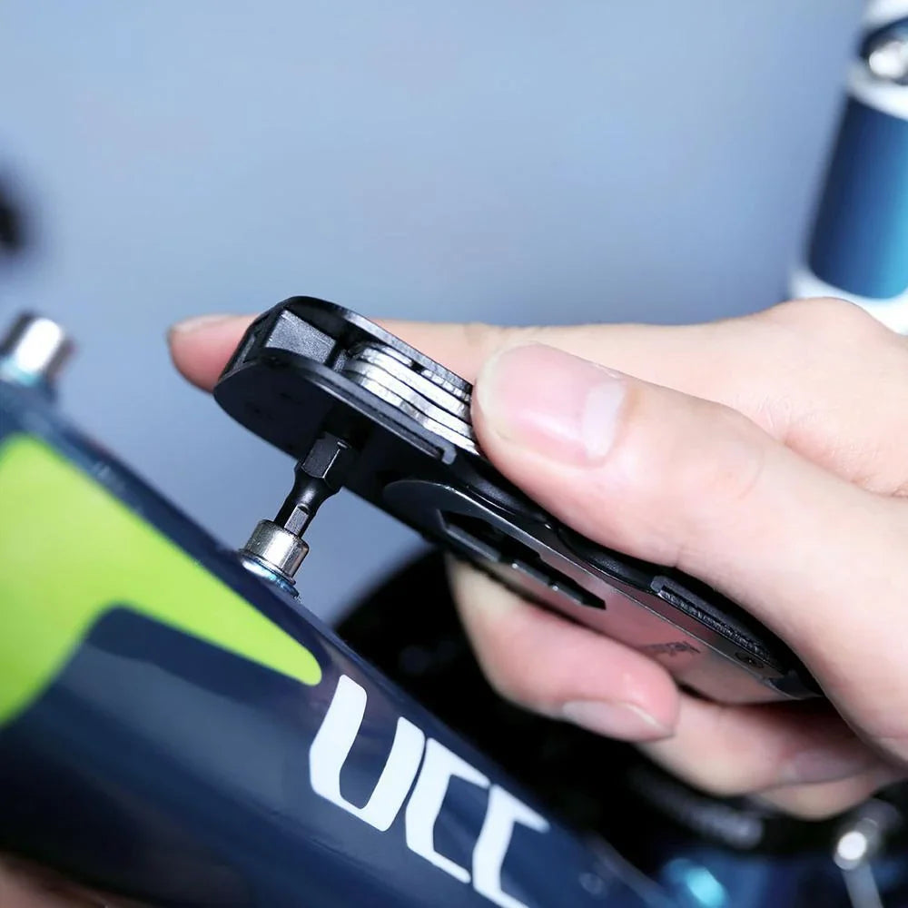 Premium multi-function bicycle repair tool set made of durable stainless steel with clamshell design and magnetic screwdriver sleeve