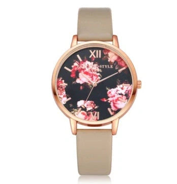 Rose gold quartz wrist watch with leather strap for women