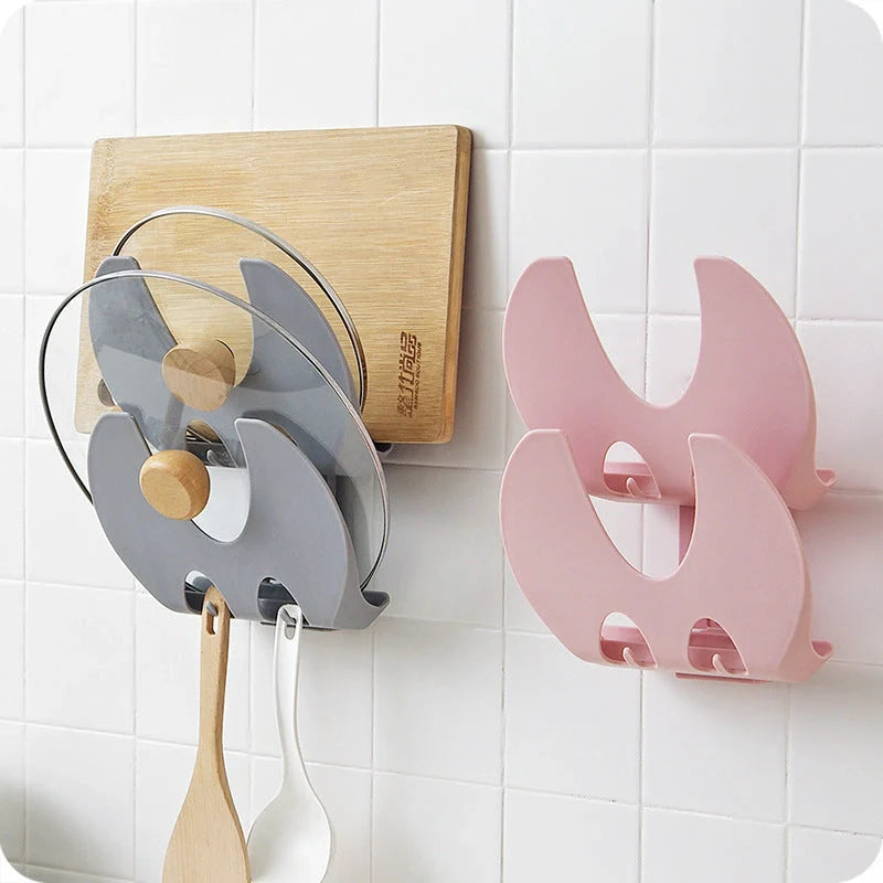 Wall-mounted kitchen organiser with double-layer storage and hooks for utensils