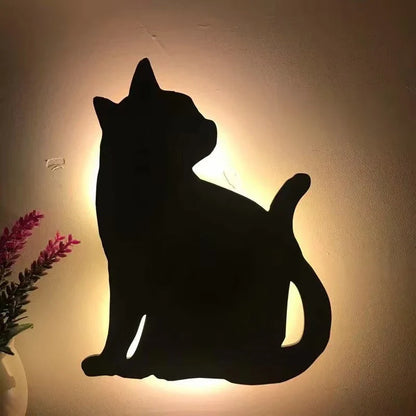 A stylish cat-shaped smart sensor night light that automatically illuminates a room when motion is detected, creating a warm and cozy atmosphere.
