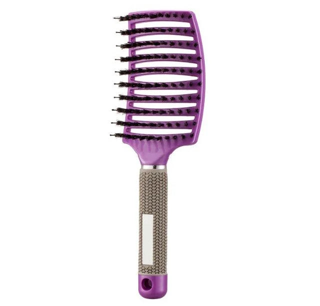 A premium hair brush with a sleek design, featuring soft bristles and a rounded massage function for healthy, detangled hair