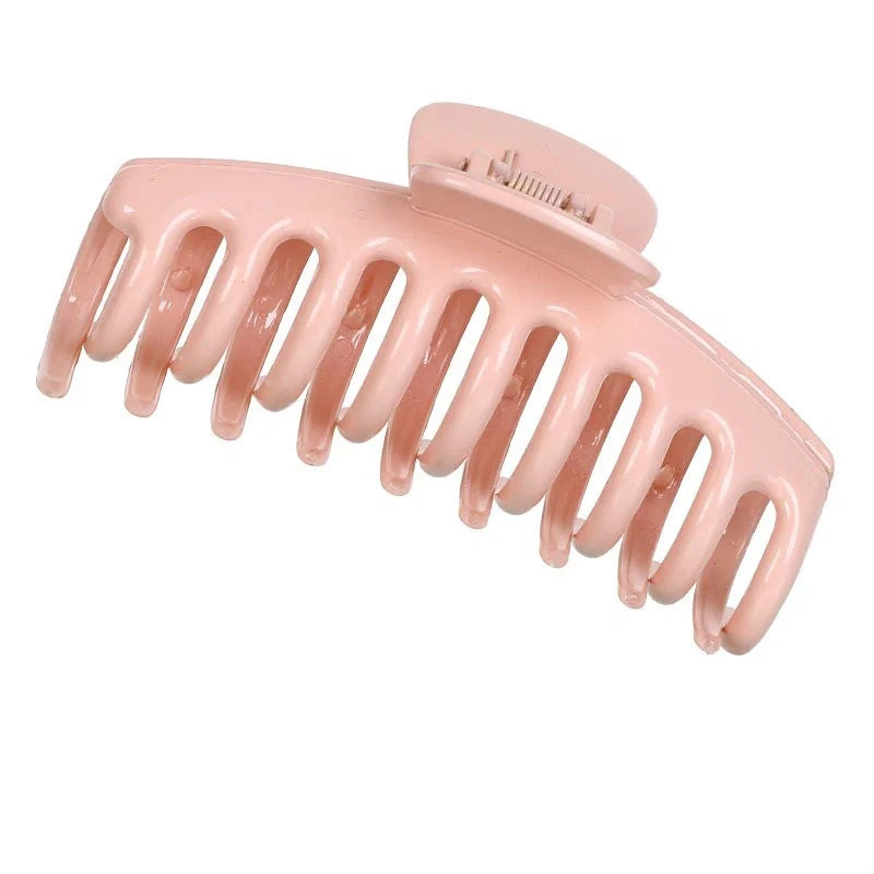 Candy-coloured plastic ponytail clip for showers and daily hair styling