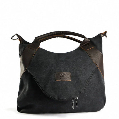 Stylish and versatile canvas shoulder bag with premium brass hardware and thoughtful interior organisation