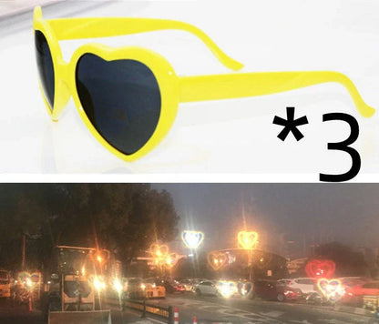 Stylish heart-shaped sunglasses with unique lens design that transforms light into enchanting special effects