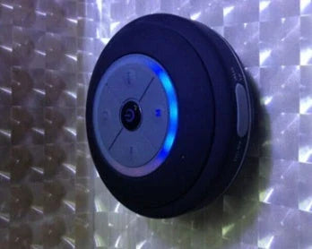 Compact waterproof Bluetooth speaker in various colours, with hands-free calling and premium audio performance