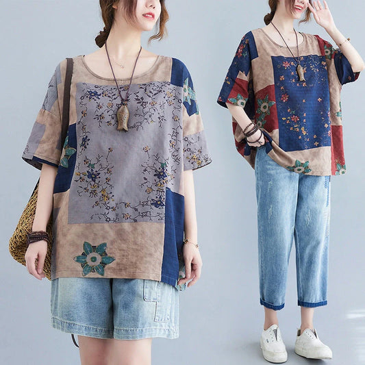 Stylish loose-fit floral print t-shirt in greyish purple, green, and navy blue colours