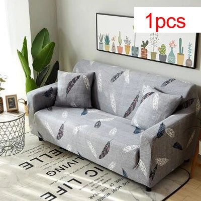 Stretchable geometric print sofa cover on a three-seater sofa