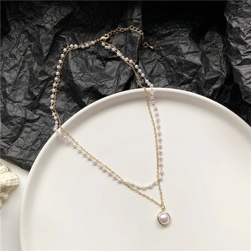Ancient Stacked Double-layer Pearl Necklace in gold with geometric design