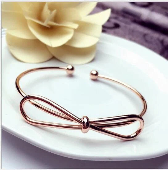 Elegant knotted O-type metal openwork bracelet in various colours