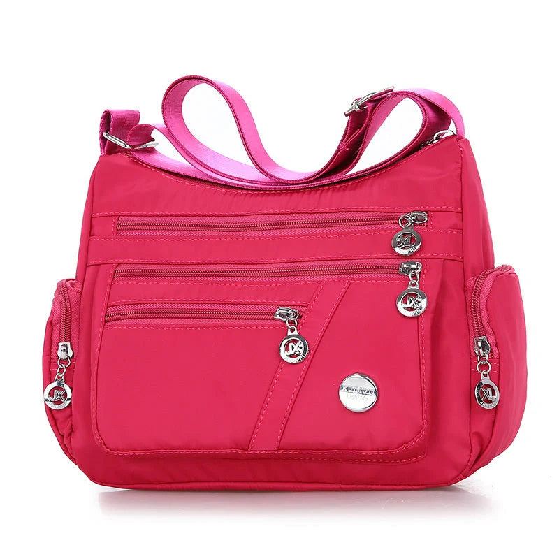 Ladies waterproof nylon oxford crossbody bag in various colors with multi-layer storage