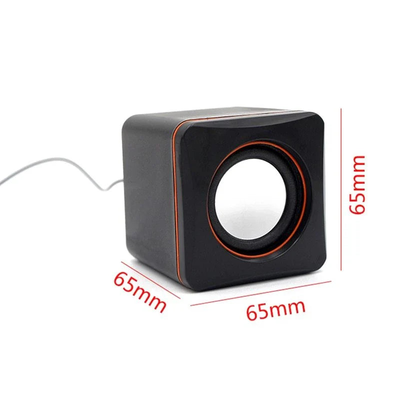 Compact USB-powered desktop speaker with sleek black design and volume control