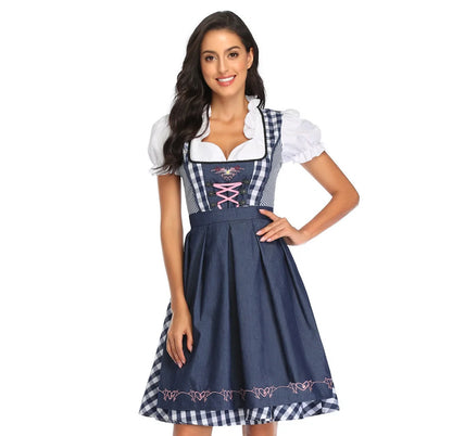 Traditional Oktoberfest ethnic dress for women in vibrant red denim with apron and ribbon