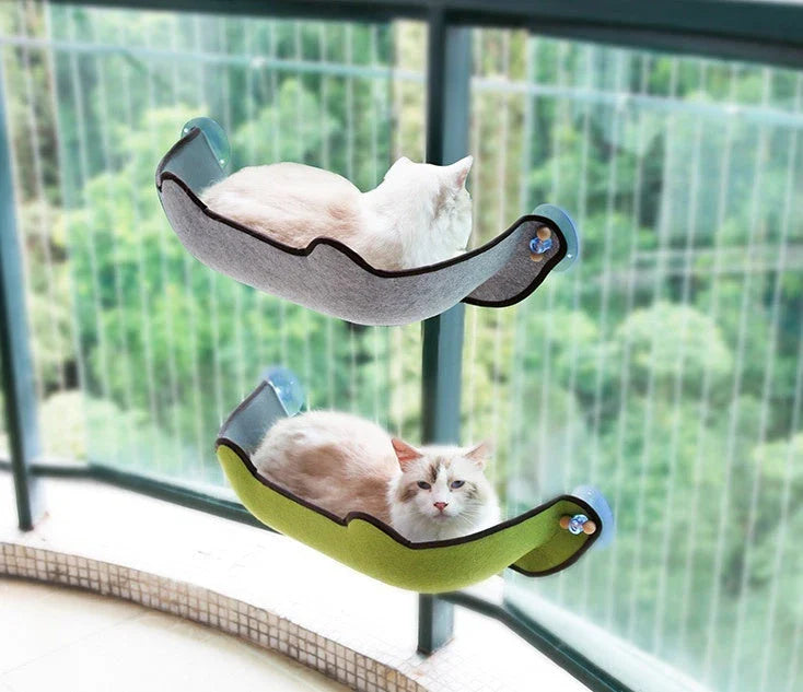 Cozy window-mounted cat hammock with soft, breathable felt cloth and powerful suction cups for easy installation on any flat surface