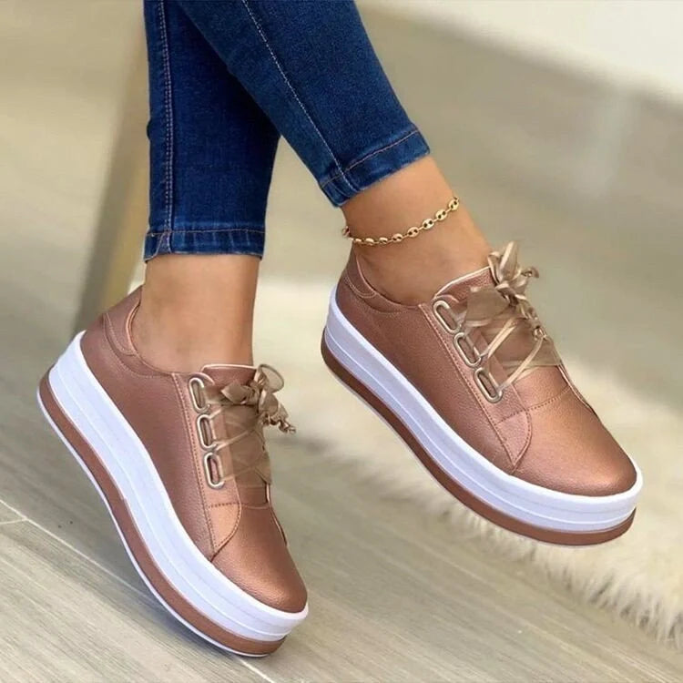 Women's ribbon lace-up platform sneakers in black, gold, silver, and rose gold