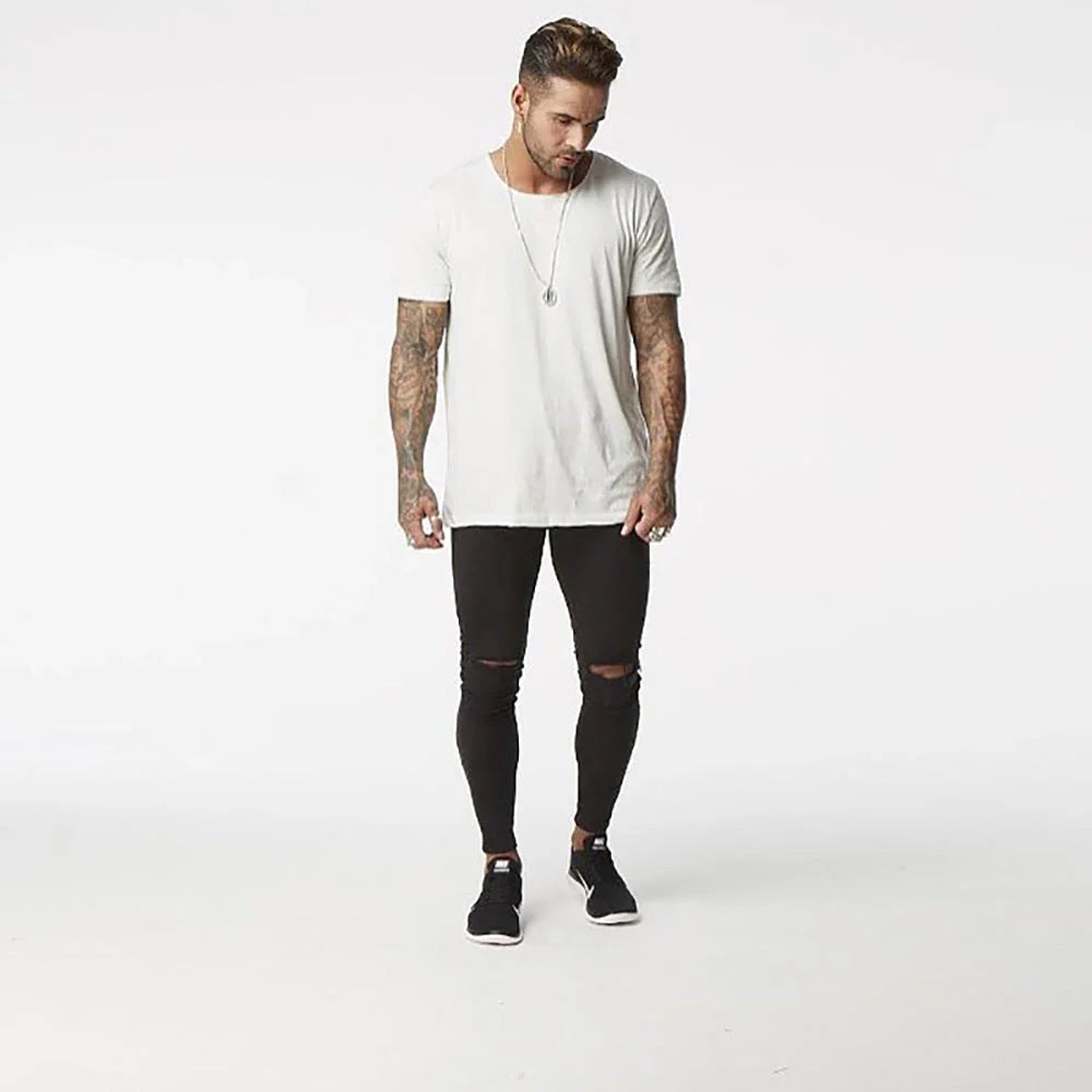 Premium cotton summer distressed skinny jeans for men with a slim, stretchy fit and an edgy, washed-out finish