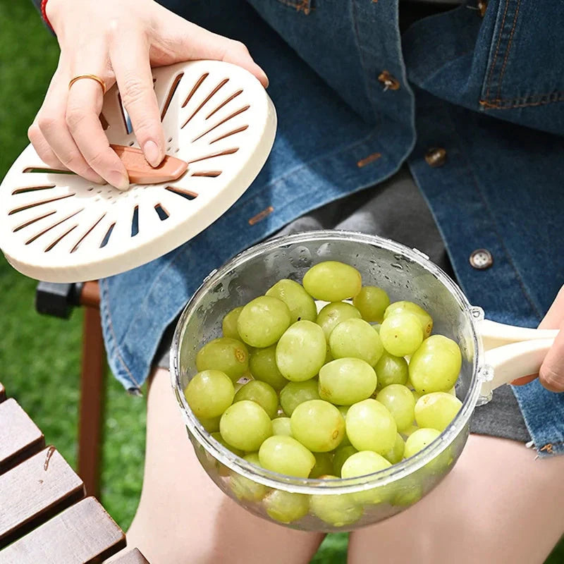 Versatile fruit drain basket with lid and foldable handle for fresh produce storage