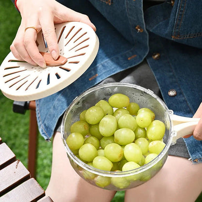 Versatile fruit drain basket with lid and foldable handle for fresh produce storage