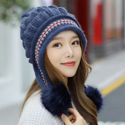 Knit fleece beanie with ear flaps and pompom in various colours for winter warmth