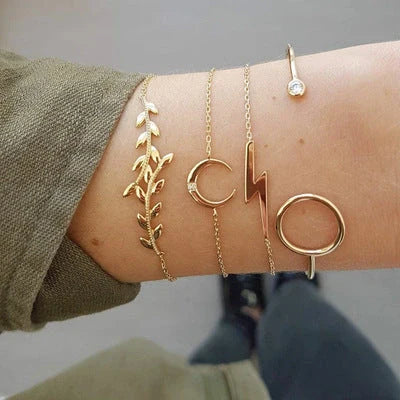 Adjustable geometric bracelet set with crystal and leaf motifs