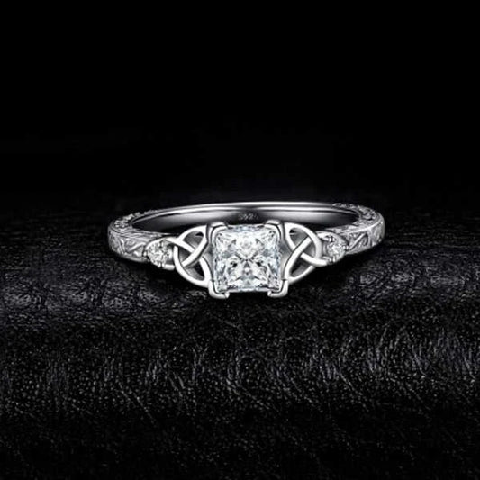 Elegant constellation-inspired engagement ring with brass and electricity white steel construction
