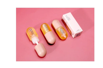 Day Night Instant Volume Lip Plumper Oil in light yellow for hydration and repair
