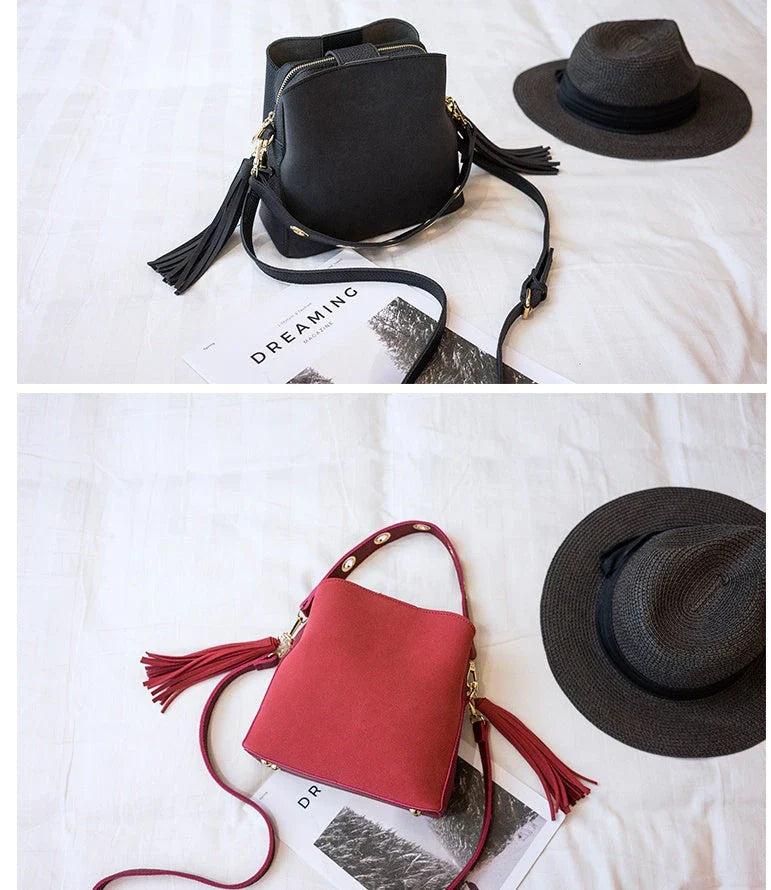 Trendy frosted tassel bucket bag in a range of classic colors, featuring a spacious interior and a dedicated camera pocket for maximum convenience.