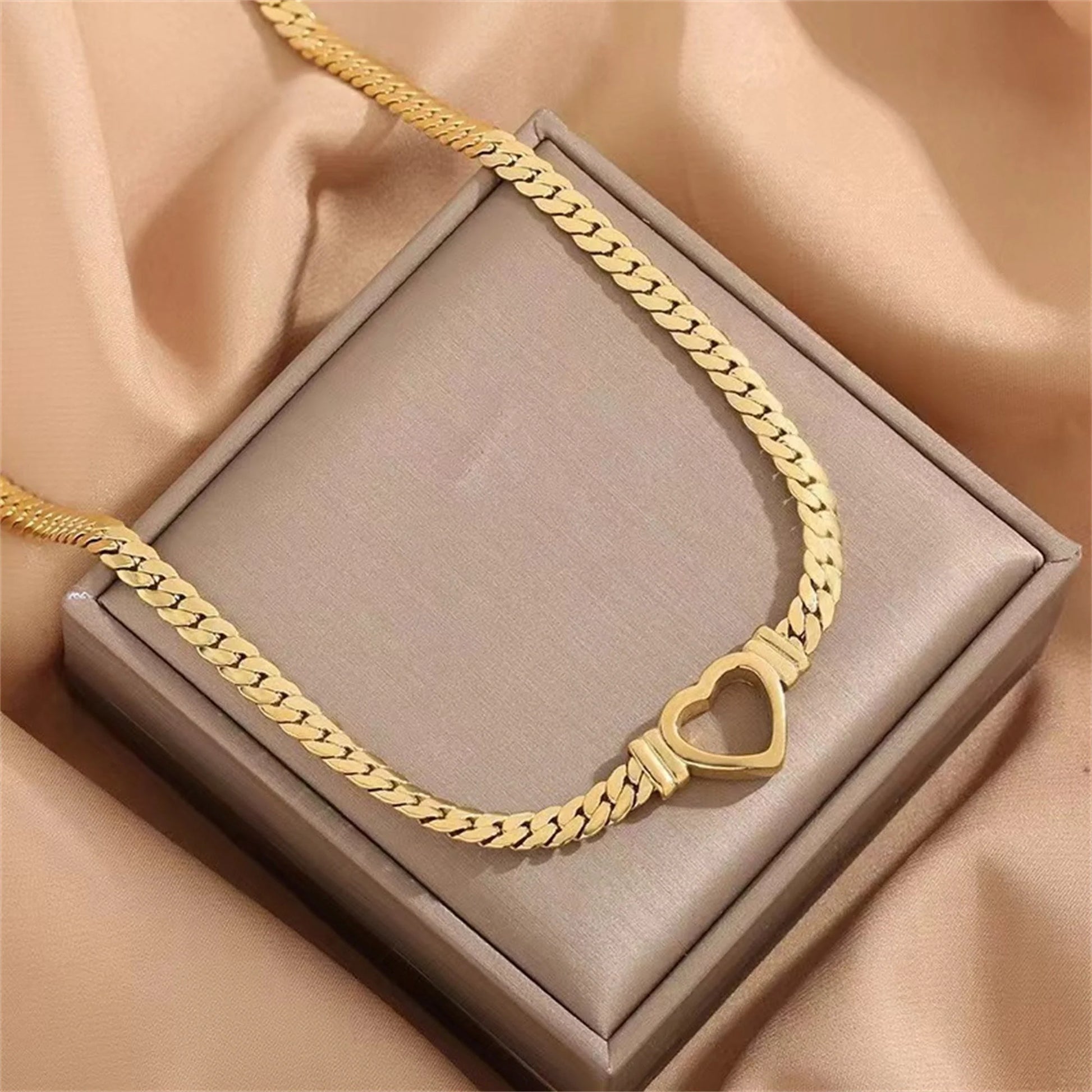 Personalised love chain necklace and bracelet set in titanium steel with heart-shaped design