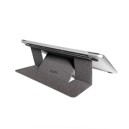 Adjustable laptop stand with adjustable height, anti-slip surface, and cable management for improved ergonomics and productivity